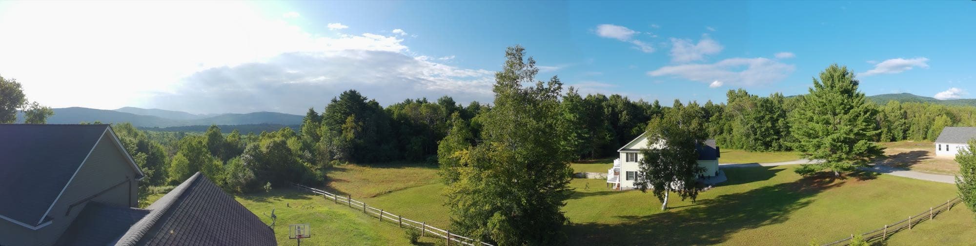 Drone photo of a Rutland County home from a wide overhead angle